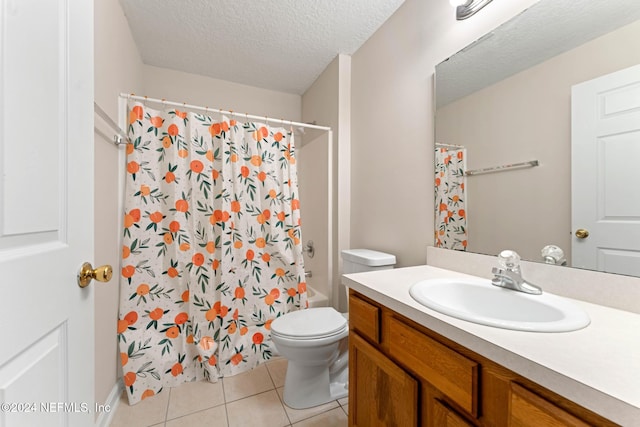 full bathroom with toilet, tile patterned floors, a textured ceiling, vanity, and shower / tub combo