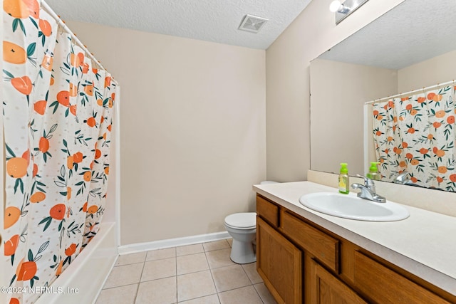 full bathroom featuring vanity, a textured ceiling, shower / bath combo, tile patterned flooring, and toilet