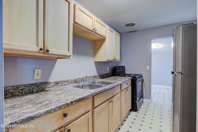 kitchen featuring black / electric stove, stainless steel fridge, sink, and light brown cabinets