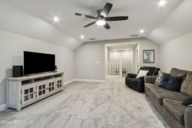 living room featuring carpet, vaulted ceiling, and ceiling fan