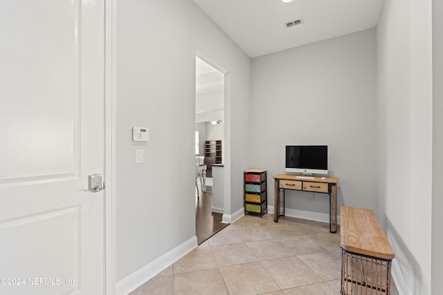 interior space with light tile patterned flooring