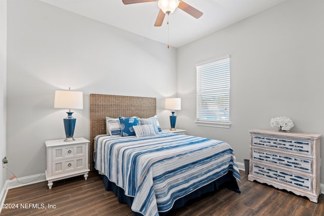 bedroom featuring ceiling fan and dark wood-type flooring