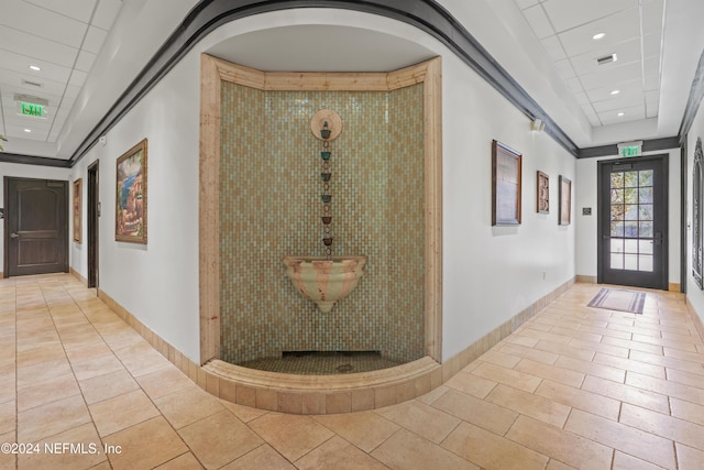 hallway featuring light tile patterned floors