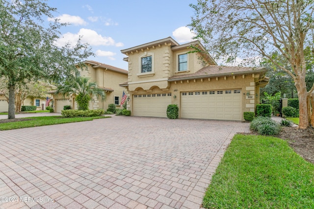 view of front of home with a garage