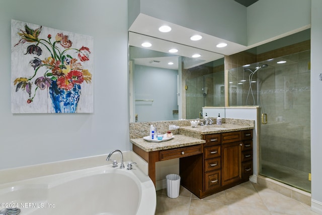 bathroom with separate shower and tub, vanity, and tile patterned floors