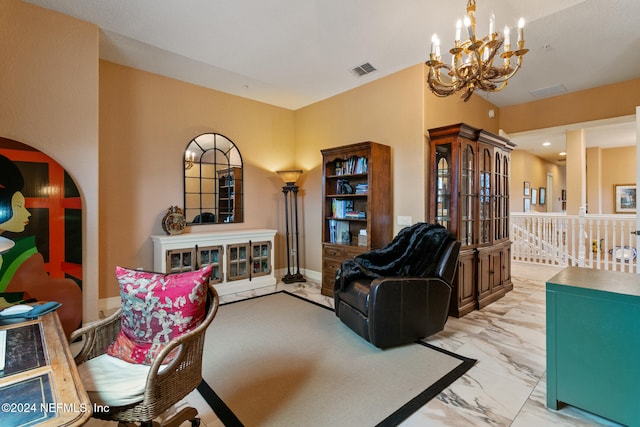 living room featuring a chandelier