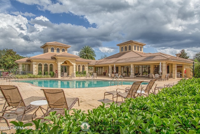 view of pool featuring a patio area