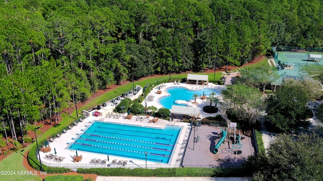 view of pool with a playground