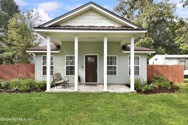 bungalow with a front lawn