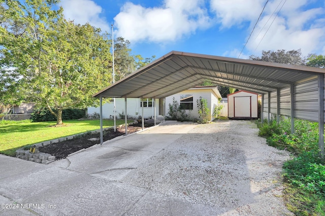 view of vehicle parking with a yard and a carport