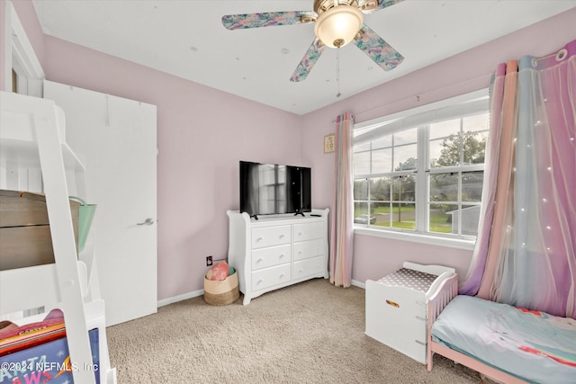 bedroom with ceiling fan and light colored carpet