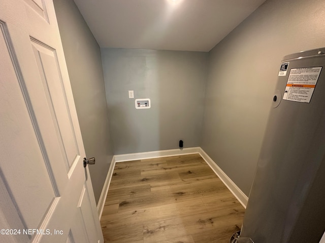 washroom with washer hookup and light wood-type flooring