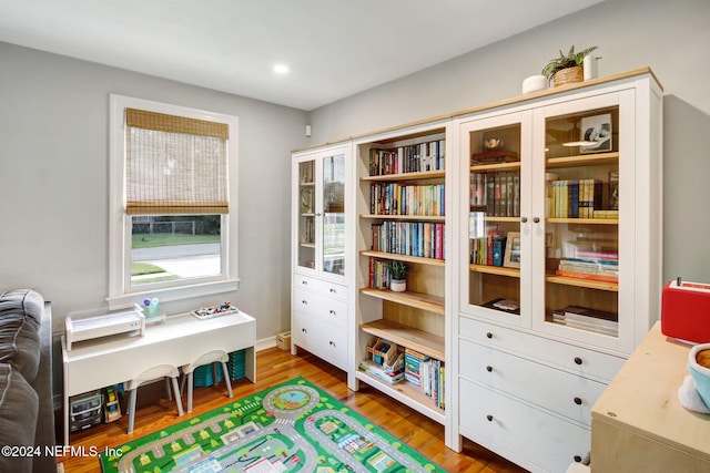 game room featuring hardwood / wood-style floors