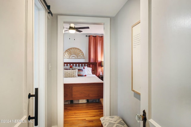 corridor featuring hardwood / wood-style flooring