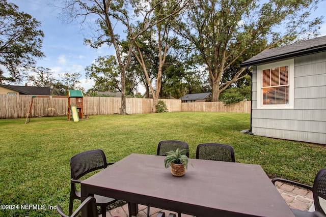 view of yard with a playground