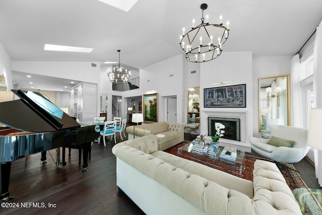 living room with dark hardwood / wood-style flooring, high vaulted ceiling, and a notable chandelier