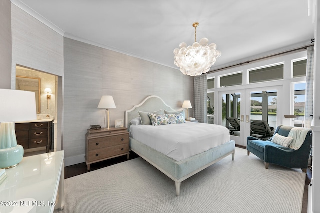 bedroom with access to exterior, french doors, ensuite bathroom, crown molding, and wood-type flooring