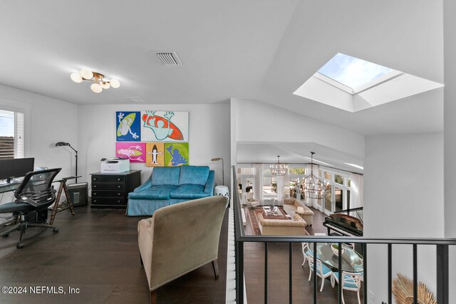 office featuring dark hardwood / wood-style flooring, lofted ceiling, and a chandelier