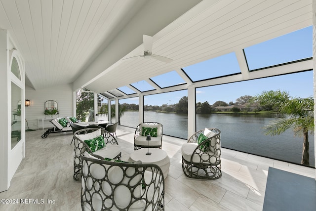 exterior space featuring a water view, ceiling fan, and lofted ceiling