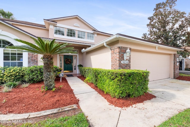 front of property featuring a garage