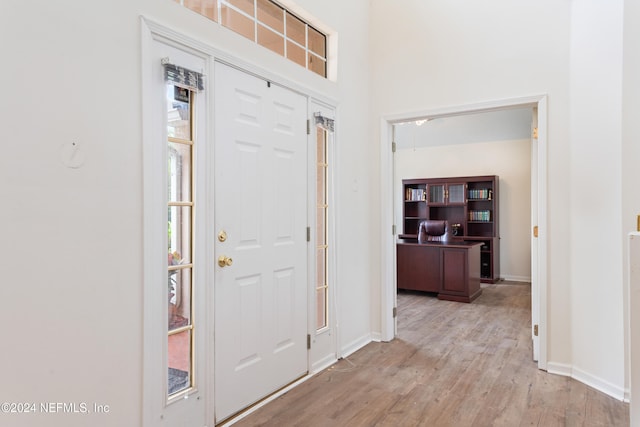 entrance foyer featuring light hardwood / wood-style floors