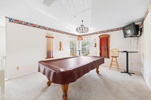 game room featuring light colored carpet, a textured ceiling, and billiards