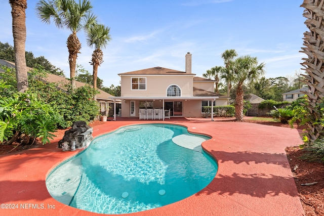 view of swimming pool featuring a patio