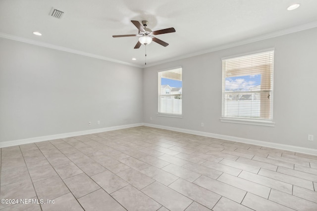 unfurnished room with ceiling fan, crown molding, and light tile patterned flooring