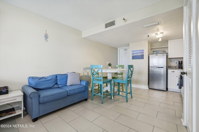 413 1st St S Unit 303, Jacksonville Beach, FL 32250 - dining space featuring light tile patterned flooring