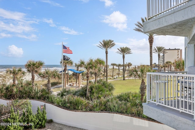 413 1st St S Unit 303, Jacksonville Beach, FL 32250 - view of home's community with a water view and a lawn