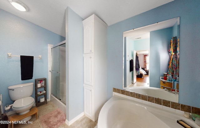 bathroom with tile patterned floors, toilet, and plus walk in shower