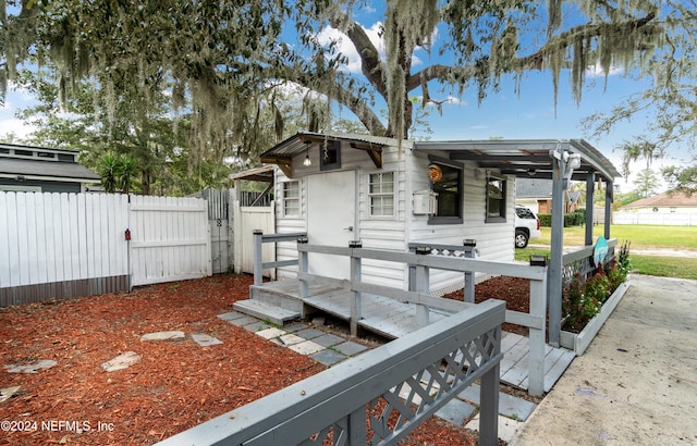 wooden deck featuring a patio area