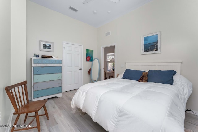 408 Third St, Saint Augustine, FL 32084 - bedroom featuring light wood-type flooring and a high ceiling
