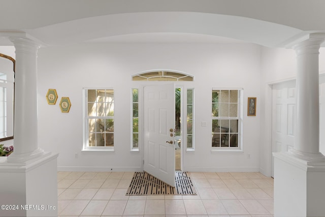 408 Third St, Saint Augustine, FL 32084 - foyer entrance with ornate columns and light tile patterned floors