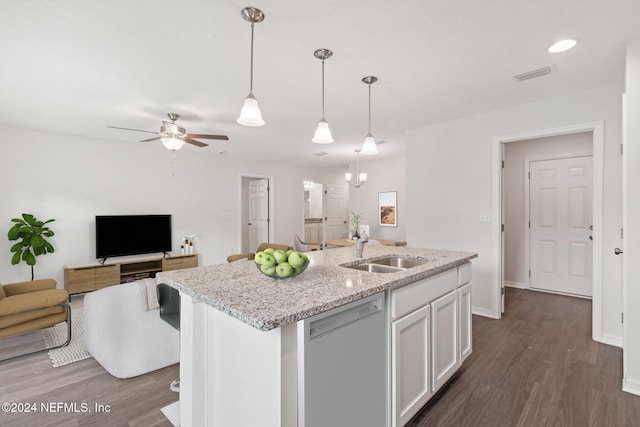 kitchen with sink, dishwasher, an island with sink, white cabinets, and decorative light fixtures