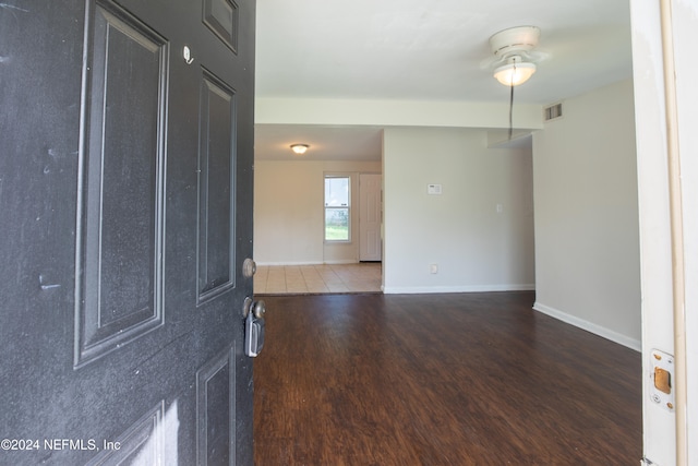 empty room featuring wood-type flooring