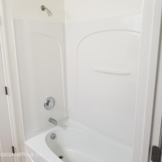 bathroom with shower / bath combination