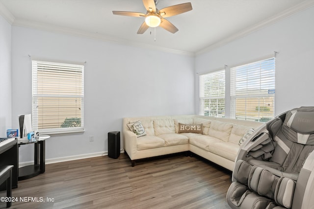 living room featuring ornamental molding, plenty of natural light, and dark wood-type flooring