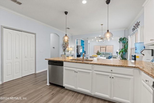 kitchen with dishwasher, white cabinetry, and crown molding