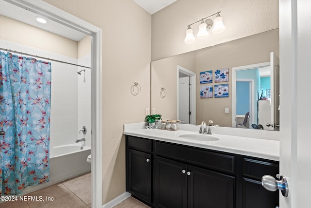 full bathroom featuring tile patterned floors, vanity, shower / bath combination with curtain, and toilet