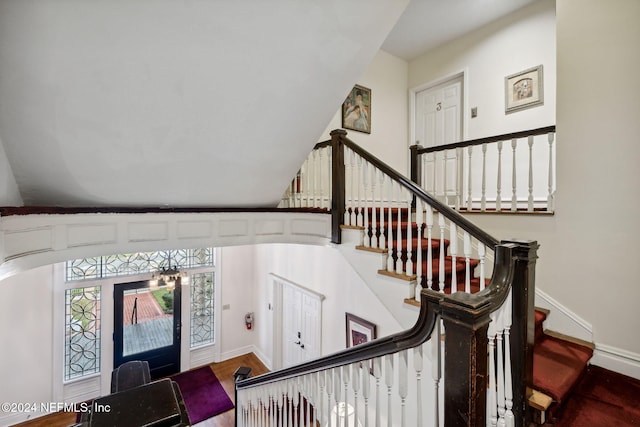 stairs with wood-type flooring