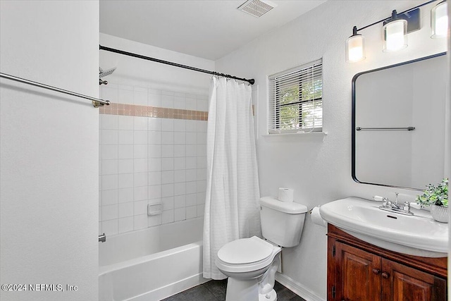 bathroom featuring toilet, visible vents, shower / bath combination with curtain, and vanity