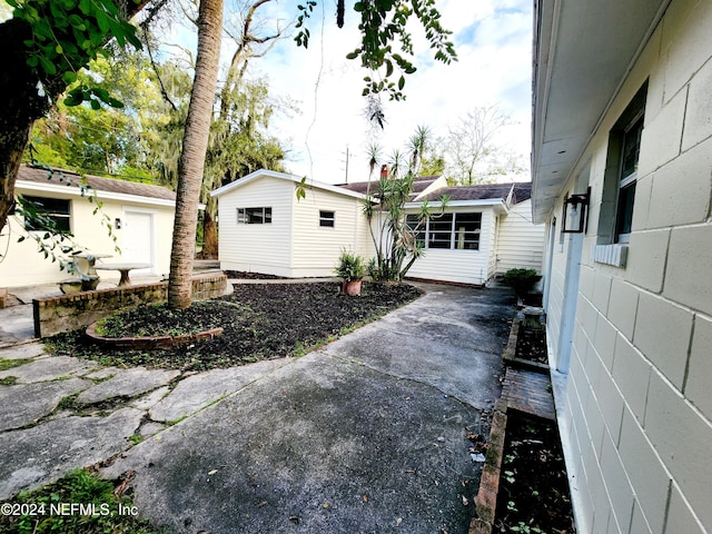 exterior space with an outbuilding