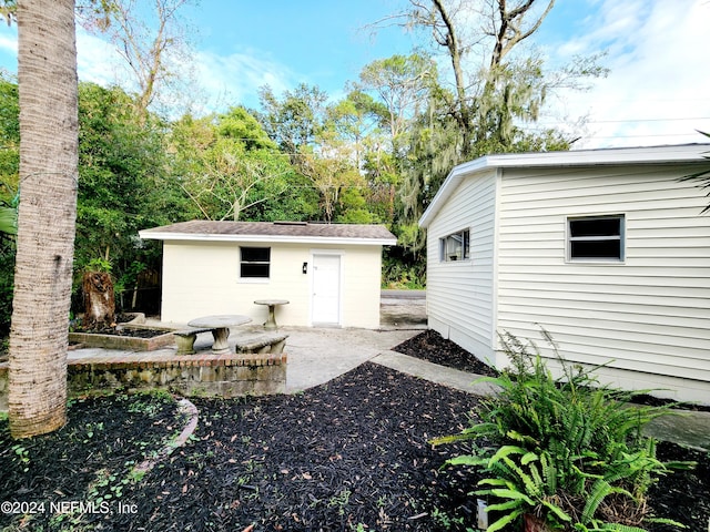 3505 Shadow St, Jacksonville, FL 32254 - view of yard with an outdoor structure and a patio area