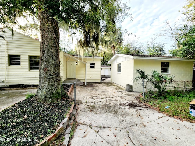 3505 Shadow St, Jacksonville, FL 32254 - back of house with concrete block siding