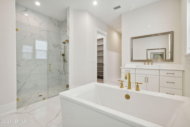 bathroom with vanity and plus walk in shower