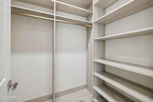 walk in closet featuring light wood-type flooring