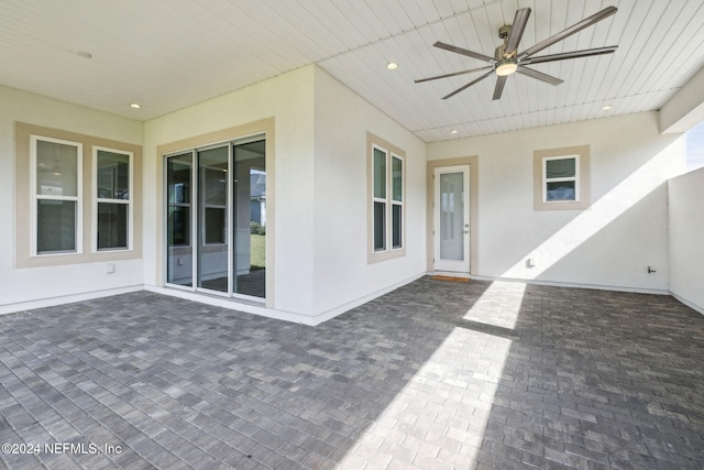 view of patio featuring ceiling fan