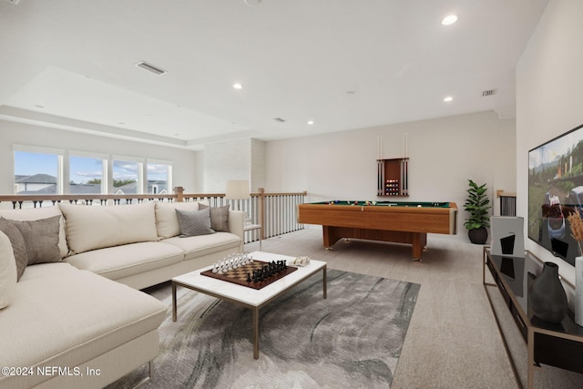 living room with light colored carpet and pool table