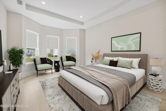 bedroom with light hardwood / wood-style floors